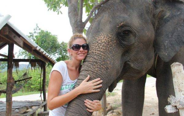 Maya is hugging an Elephant, Thailand